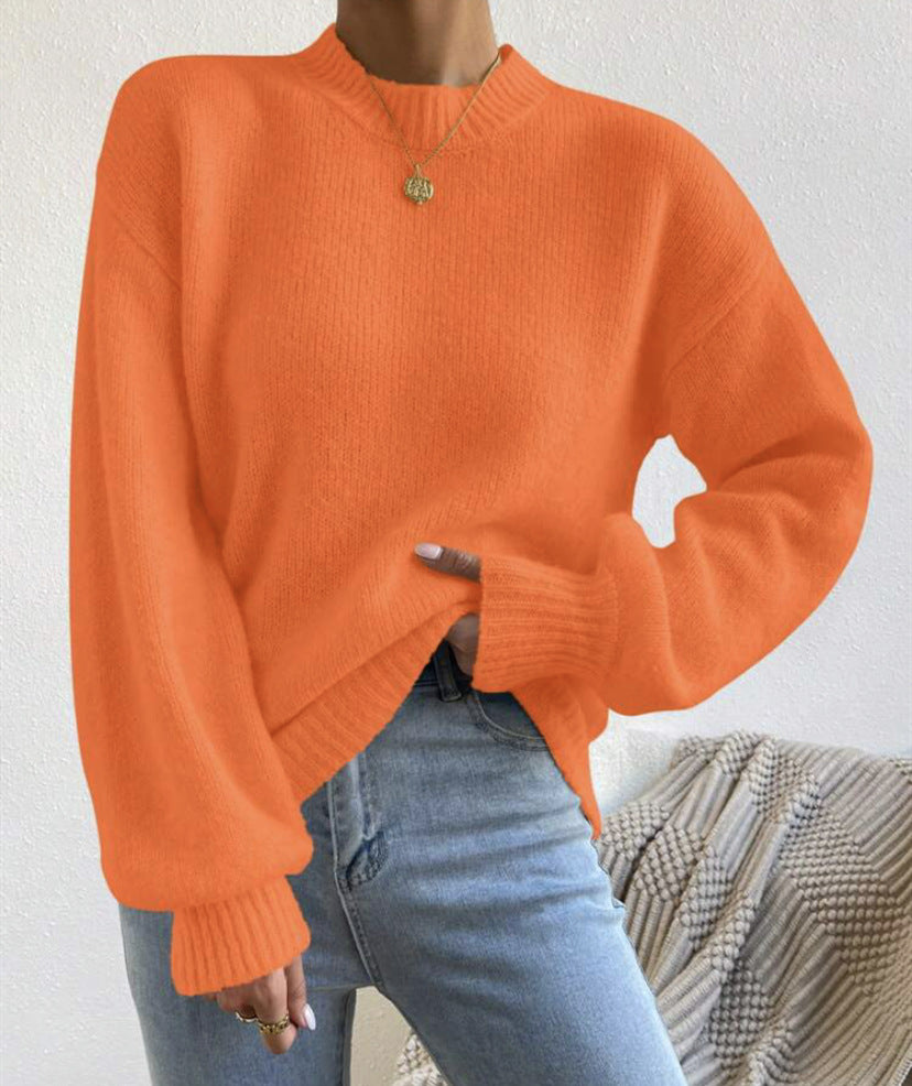 Pull col montant à épaules dénudées