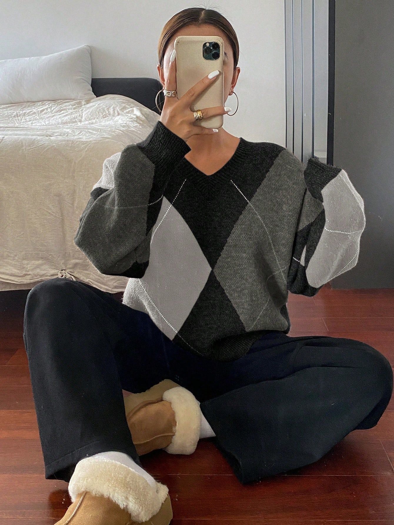 Pull ample à col ras-du-cou à manches longues à carreaux