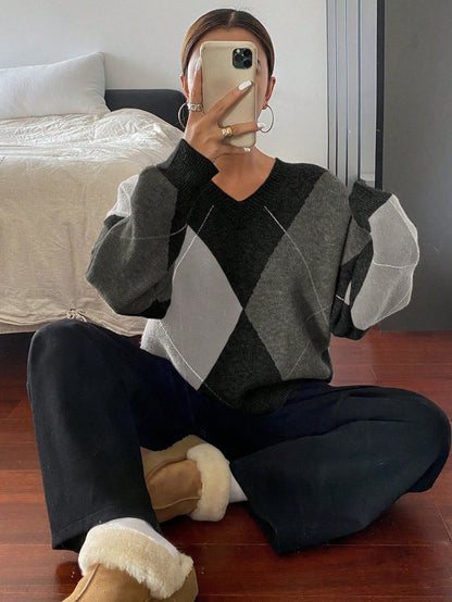 Pull ample à col ras-du-cou à manches longues à carreaux