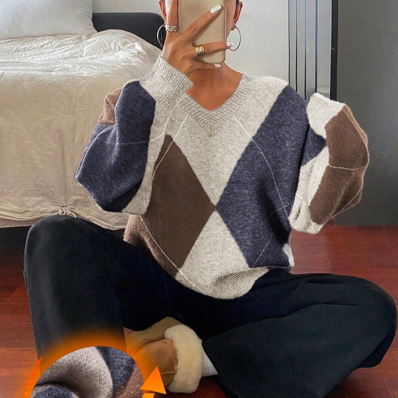 Pull ample à col ras-du-cou à manches longues à carreaux